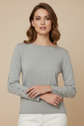 Mannequin femme S-M avec pull gris à perles